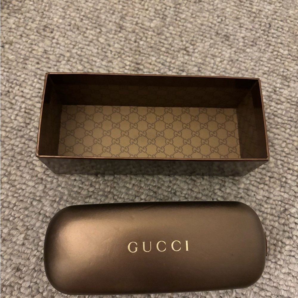 Gucci titanium eye glasses